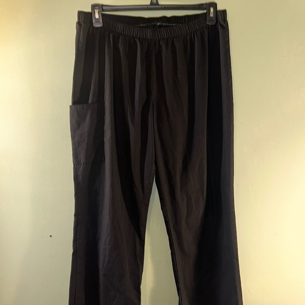 Black womens scrub pants fundamentals brand donating September 2025